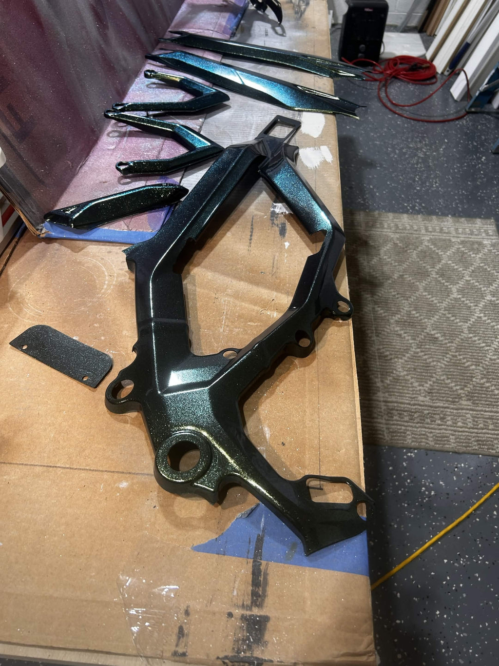 “Chameleon Teal” Coated Surron Ultra Bee Frame Guards
